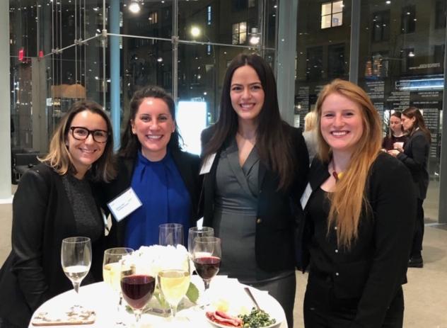 Annual New York Women's Networking Event at Whitney Museum of American Art (Four women around a small high white table)