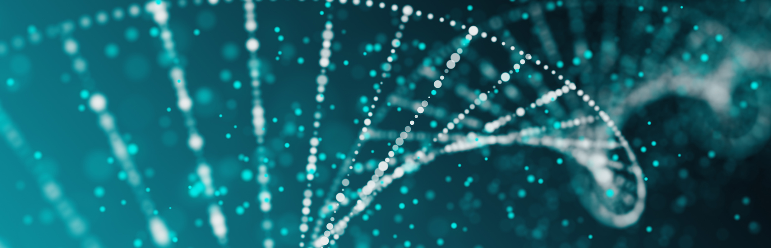 close up of a dna strand on a teal and black background
