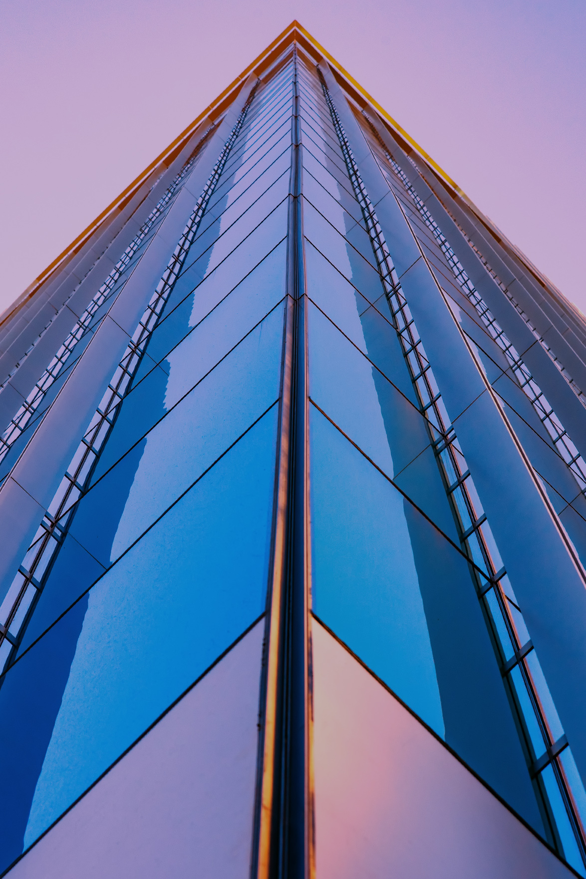 image of glass building looking up toward sky