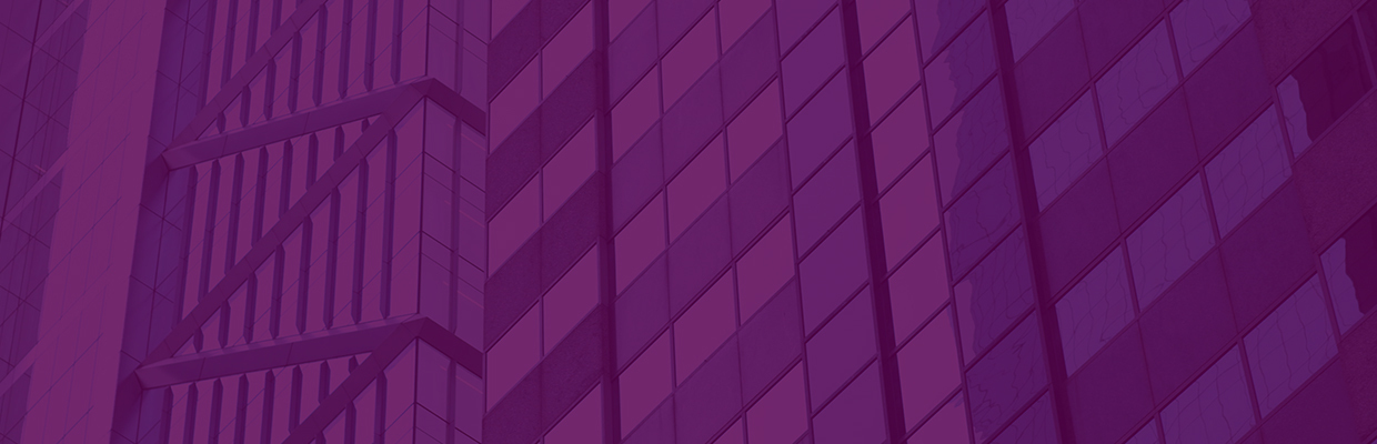 zoomed in focus of glass building with a purple overlay