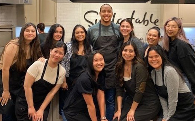 Orange County attorneys and summer associates spent an evening cooking a delicious Italian meal. Group photo wearing aprons