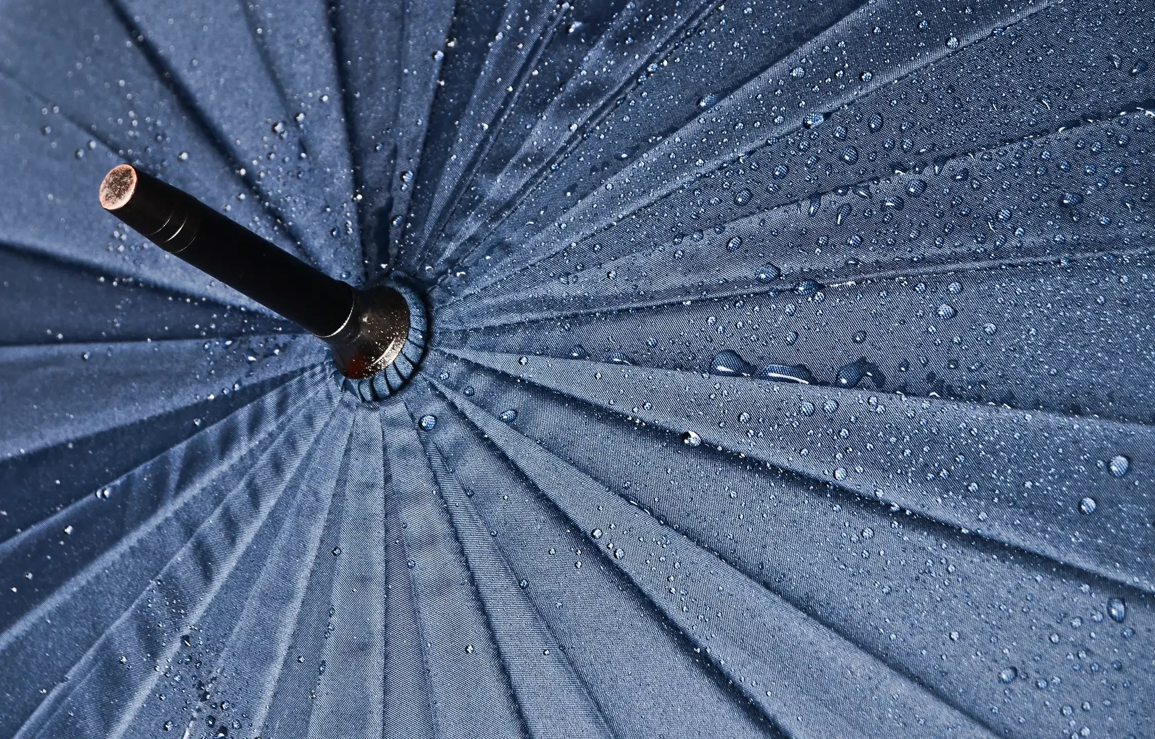 Umbrella with water drops abstract