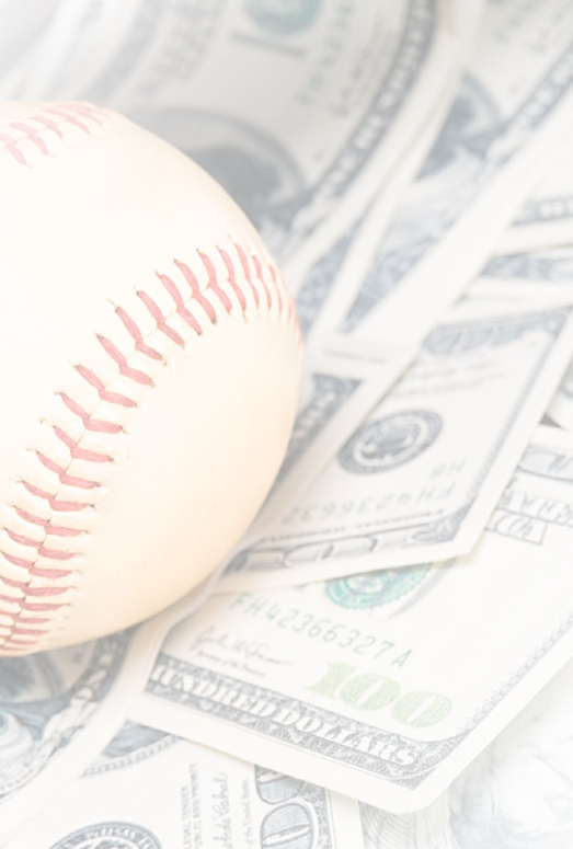 Closeup concept of baseball and money.